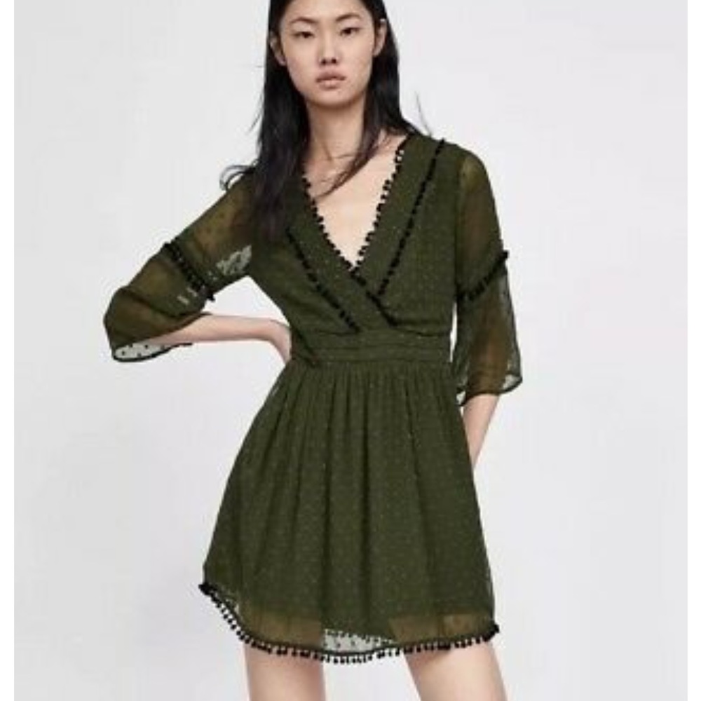 Olive green dress with pom Pom detail
